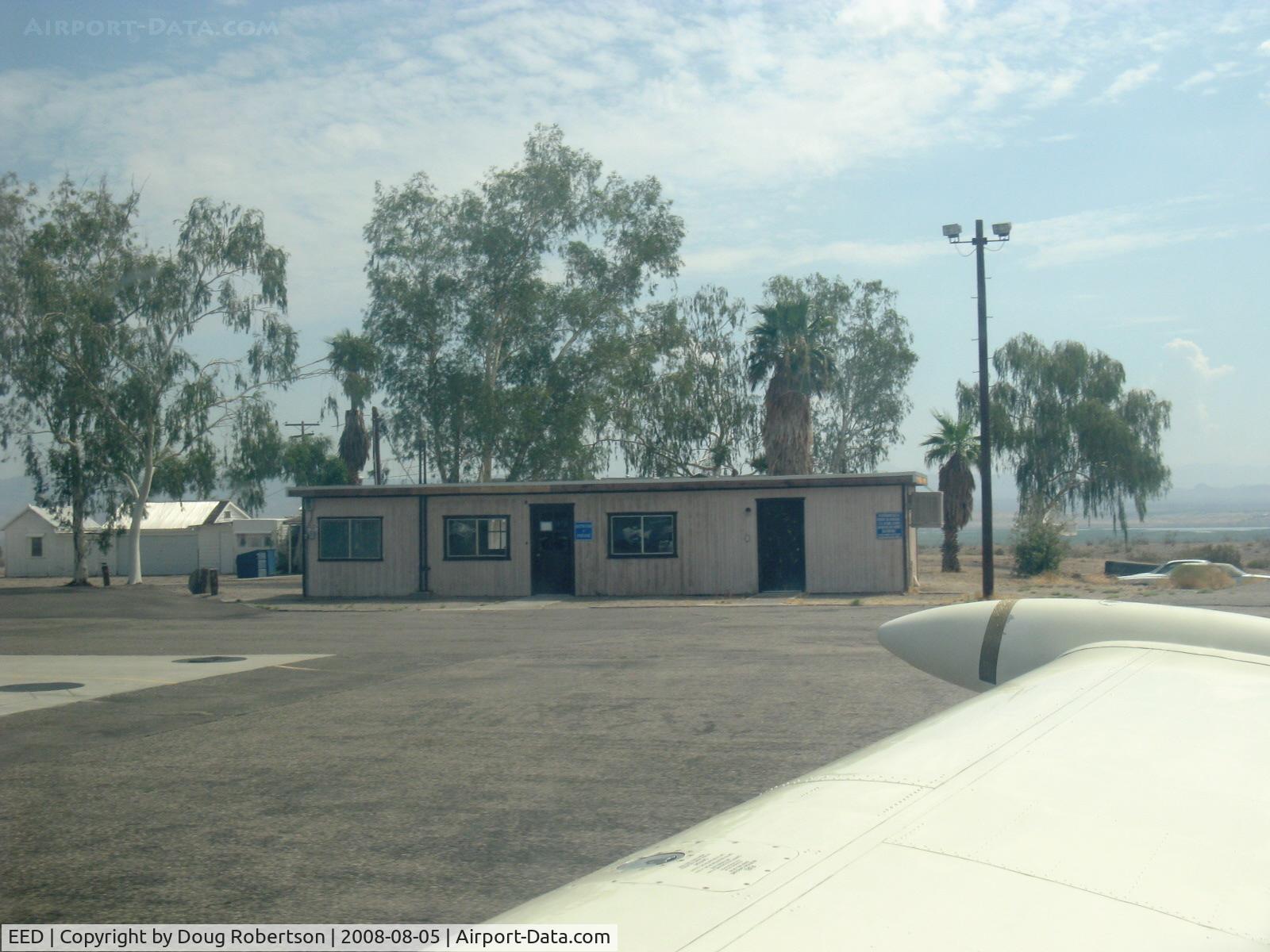 Needles Airport (EED) - Terminal Bldg. Phone to Riverside FSS, toilets and flight-planning tables