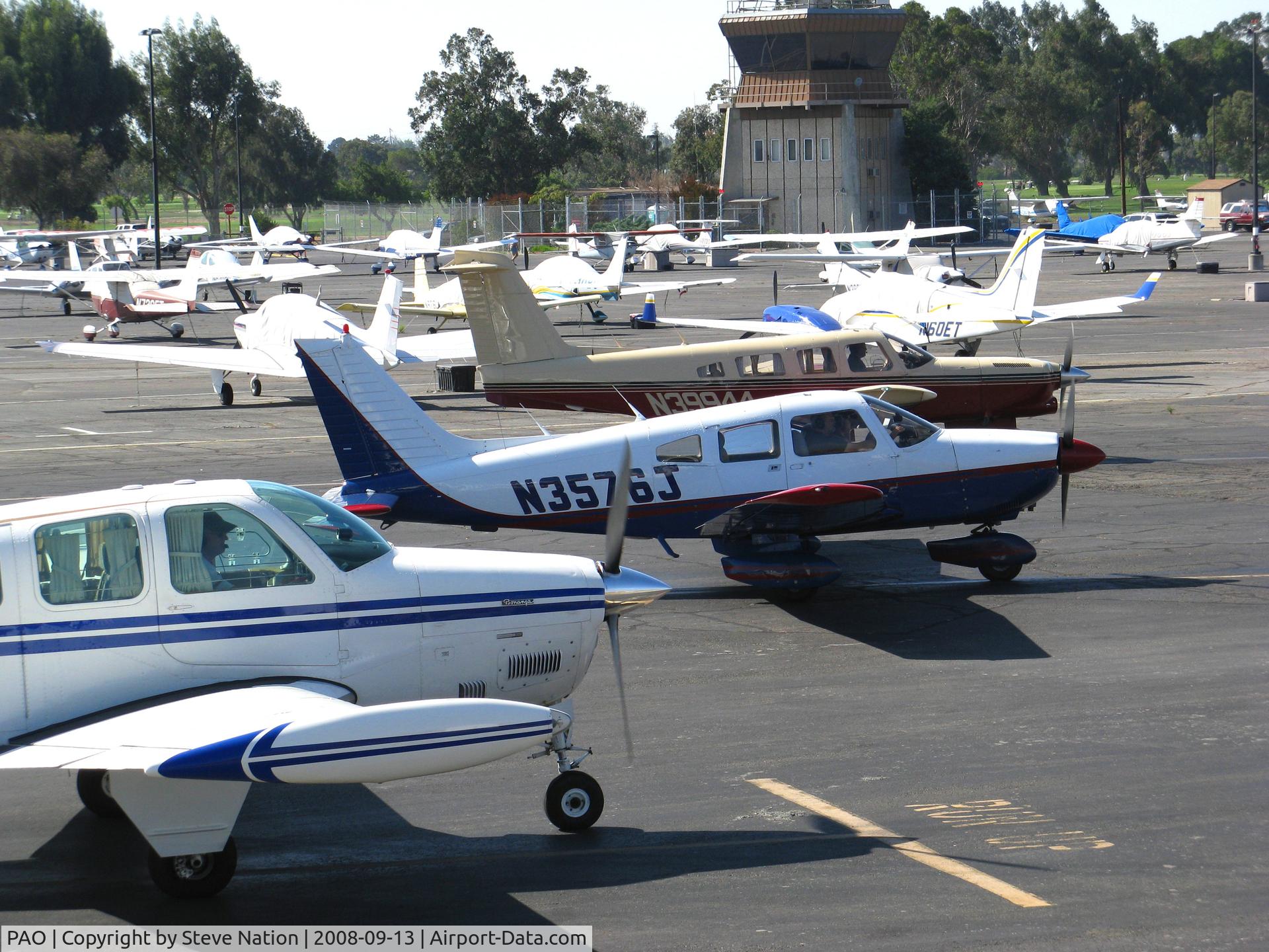 Palo Alto Arpt Of Santa Clara Co Airport (PAO) - N2051X/N3946J/N39944 running-up engines while tower lets stream of Cessnas come home