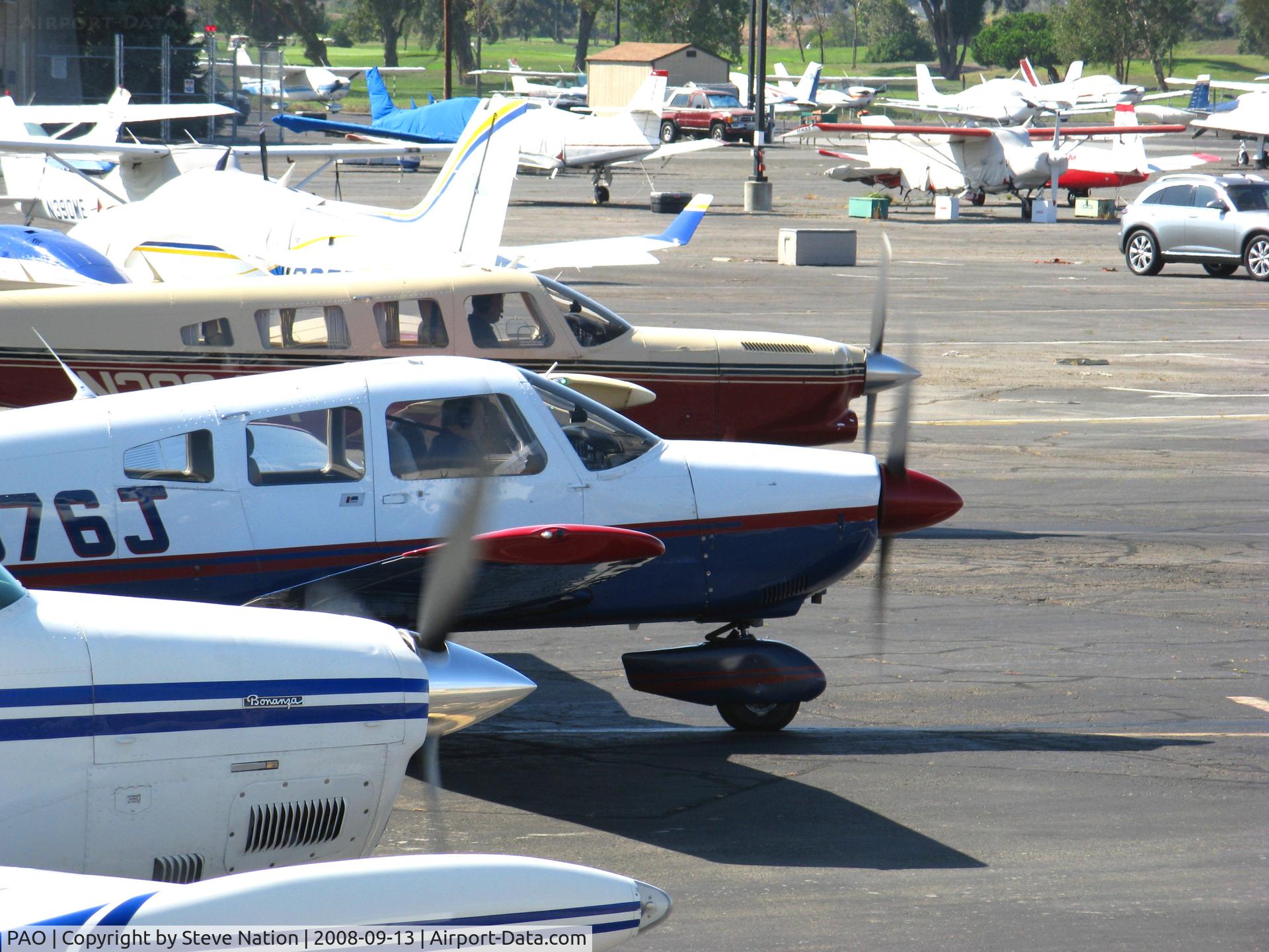 Palo Alto Arpt Of Santa Clara Co Airport (PAO) - N2051X/N3946J/N39944 running-up engines while tower lets stream of Cessnas come home