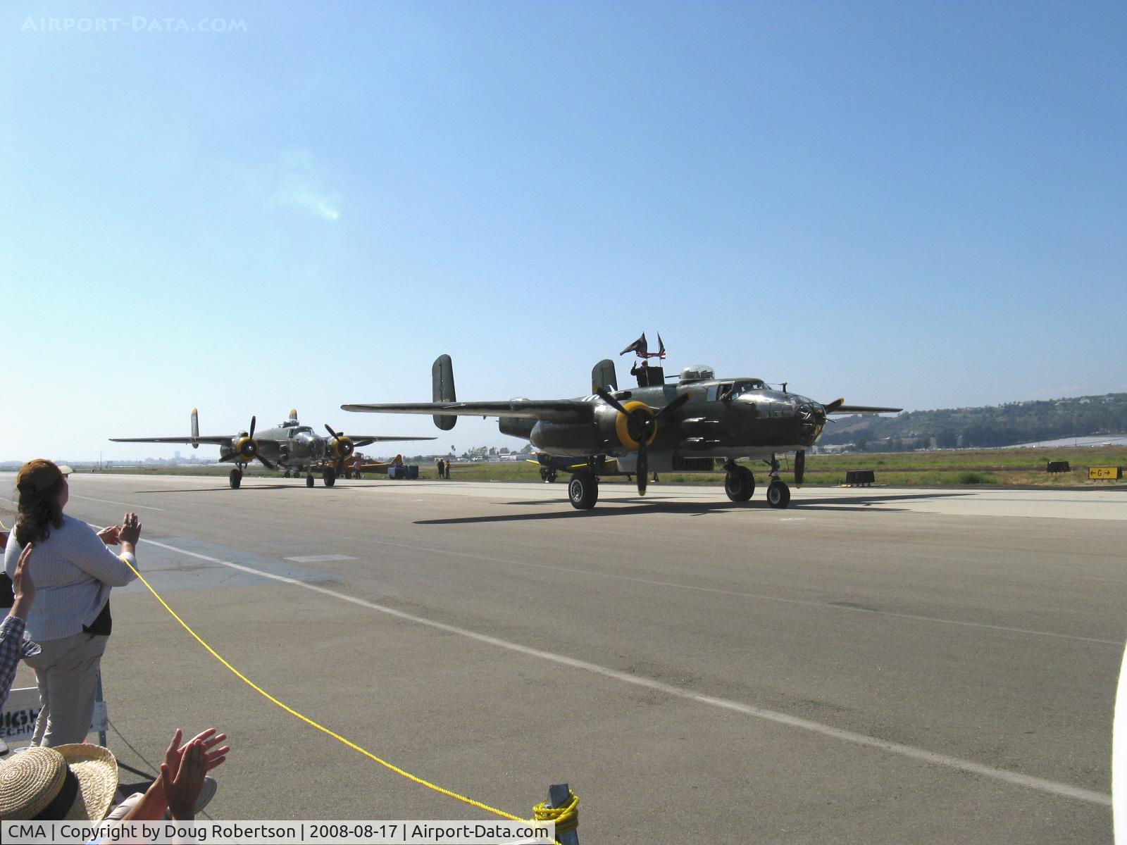 Camarillo Airport (CMA) - North American 1944 TB25Ns 'Executive Sweet' in lead & 'Heavenly Body' taxiing