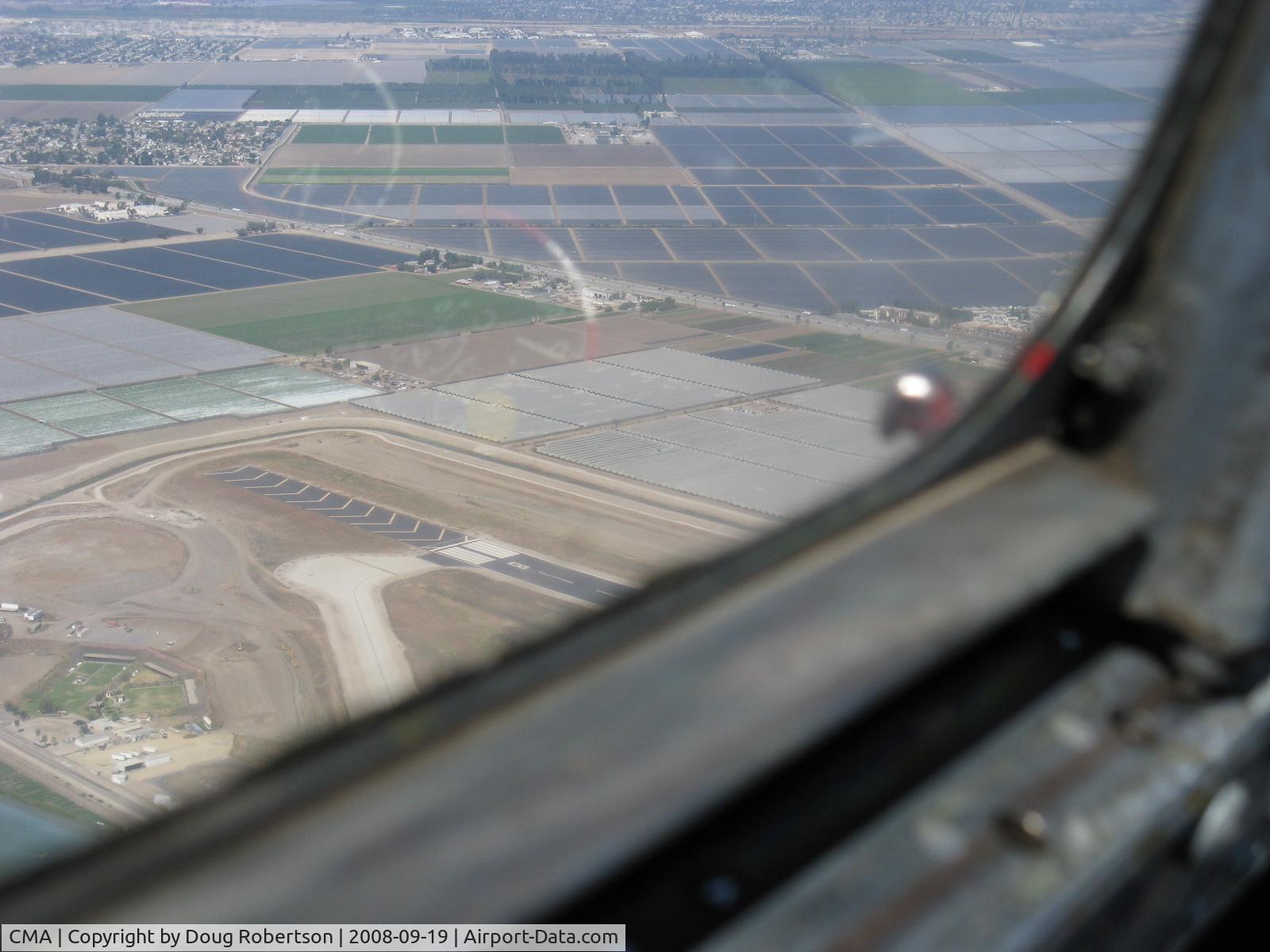 Camarillo Airport (CMA) - Displaced threshold chevron markings to 6,013' Rwy 26. Taken from north of airport from Beech 36 BONANZA