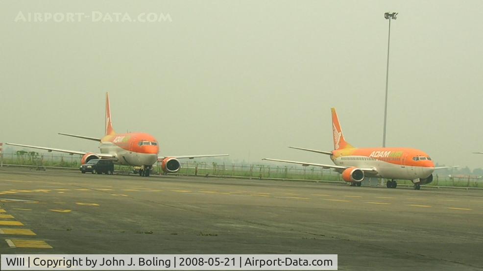 Soekarno-Hatta International Airport, Cengkareng, Banten (near Jakarta) Indonesia (WIII) - Adam Air aircraft awaiting re-po at Jakarta.