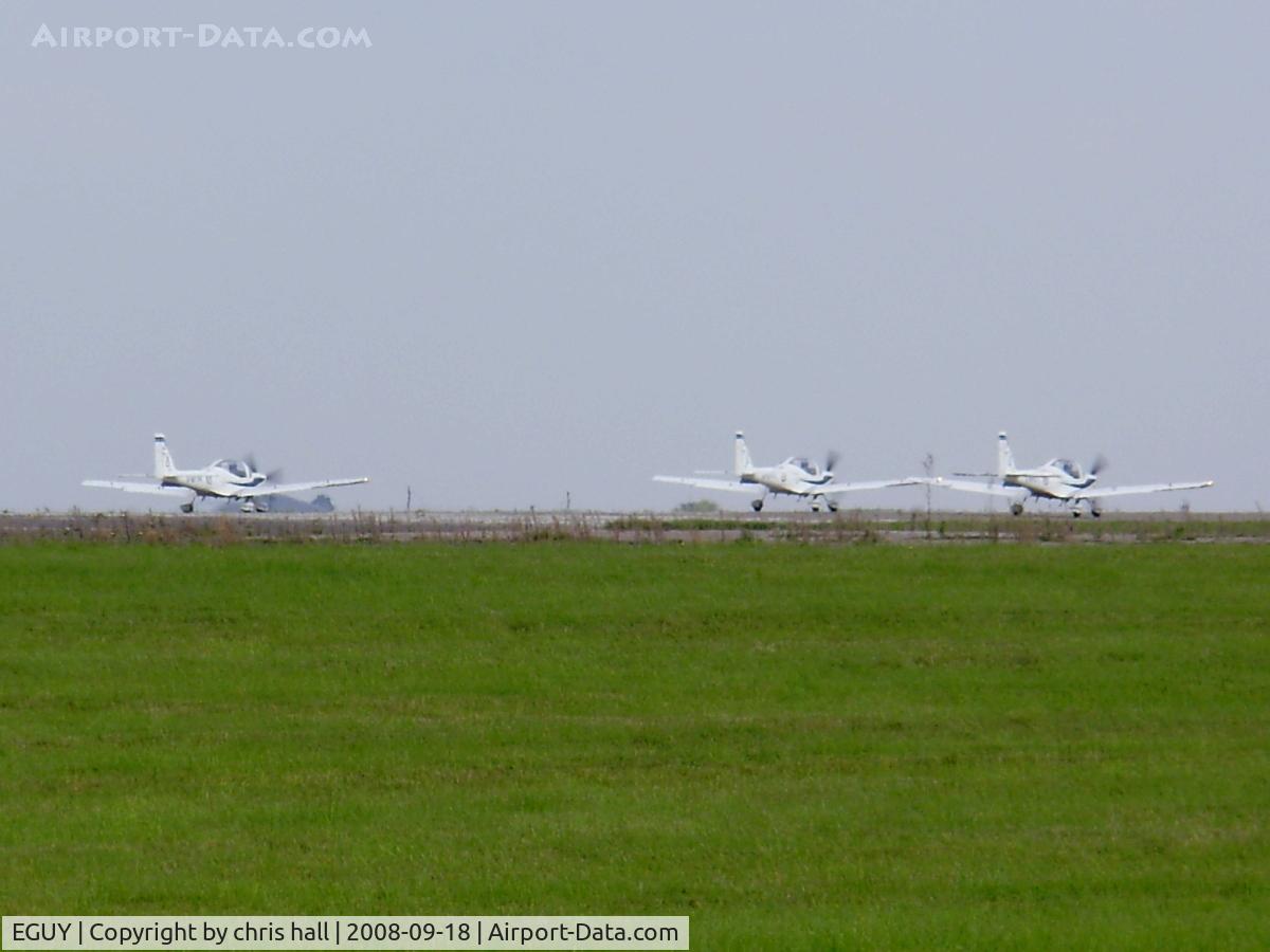 RAF Wyton Airport, St Ives, England United Kingdom (EGUY) - Three GROB G115E's ready for take-off