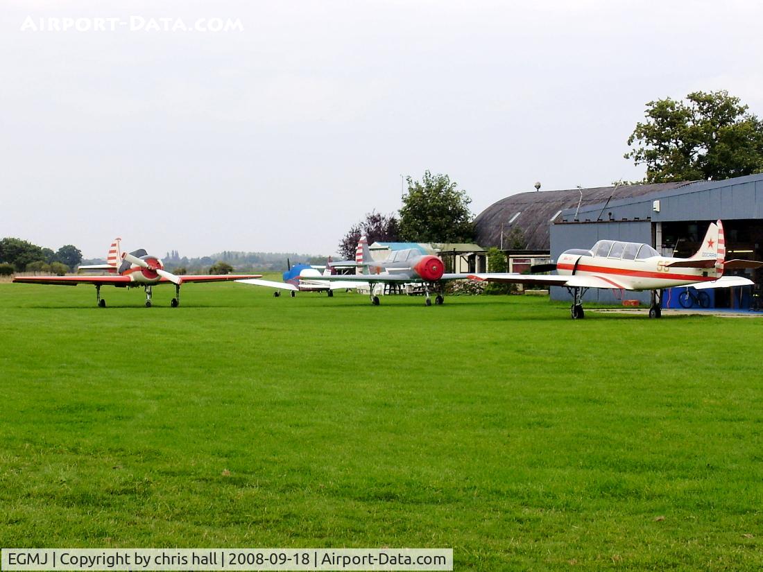 Little Gransden Airfield Airport, St Neots, England United Kingdom (EGMJ) - lots of Yak's. from left to right, RA-02209, G-CCCP, G-BVOK