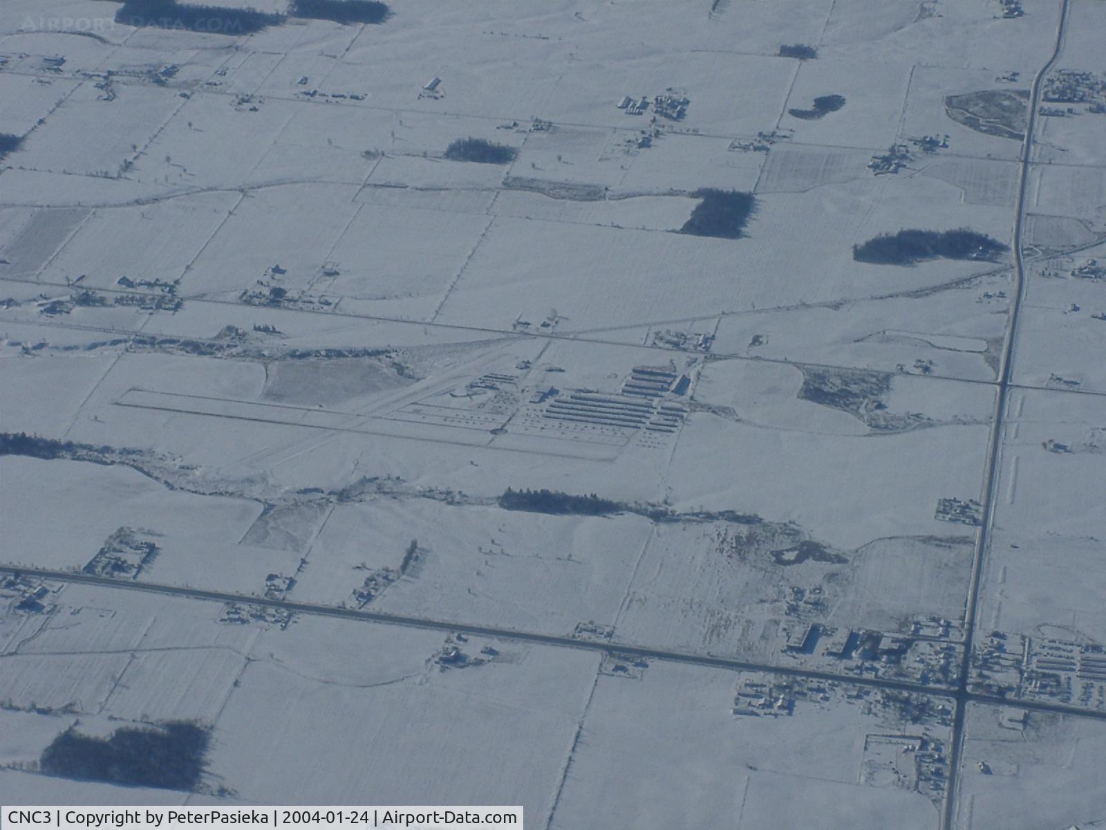 CNC3 Airport - Winter shot of Brampton Airport, ON Canada. Climbing out of Toronto International in an Air Canada A-319 to Kelona BC.