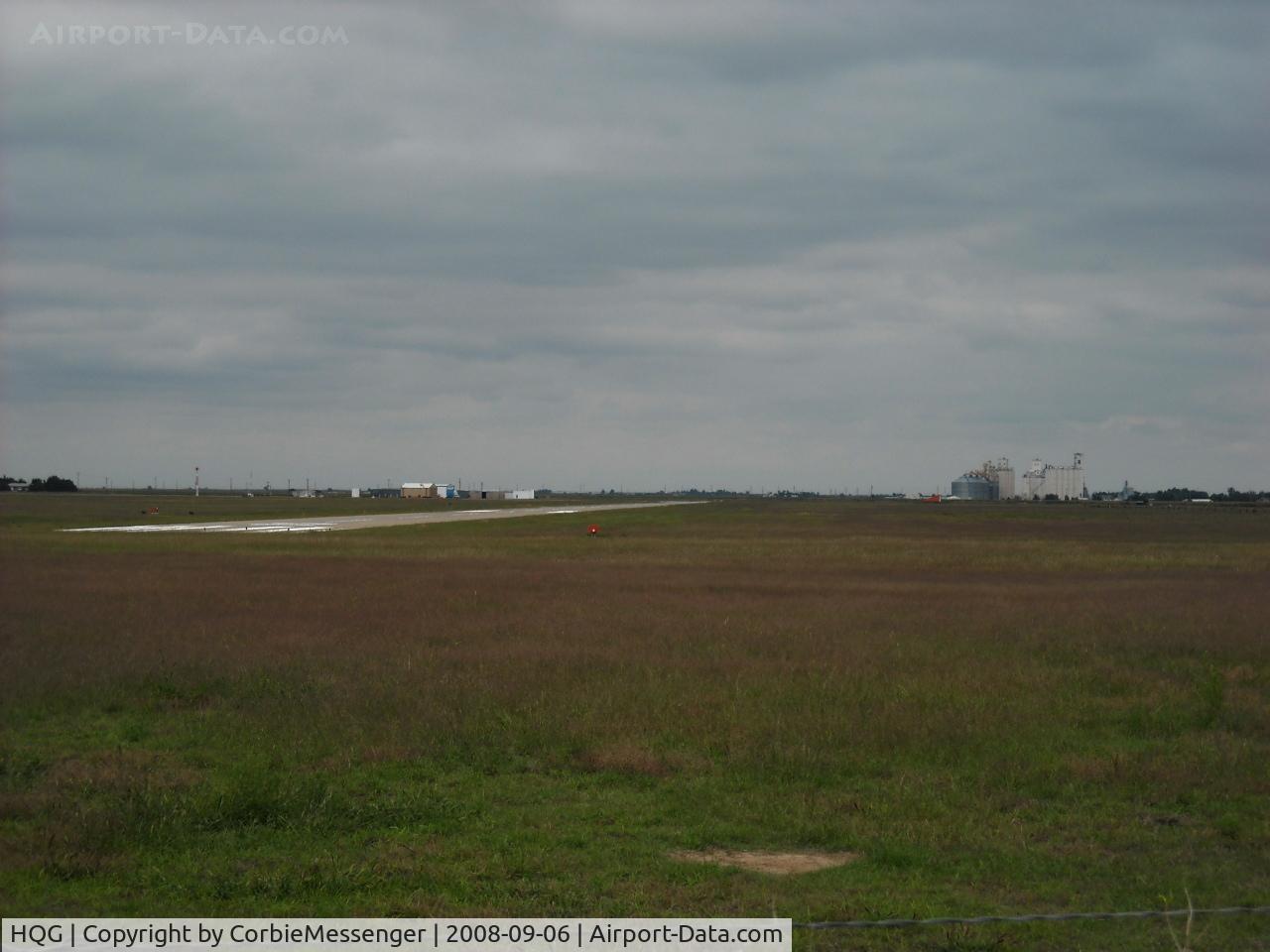 Hugoton Municipal Airport (HQG) - View of HQG from the southwest looking northeast. The threshhold of 02 is visible in the foreground.