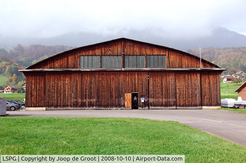 LSPG Airport - This former military hangar is now in use by the Kägiswil flying club.