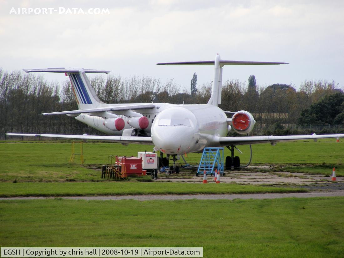 Norwich International Airport, Norwich, England United Kingdom (EGSH) - Fokker 100 stored at Norwich Airport