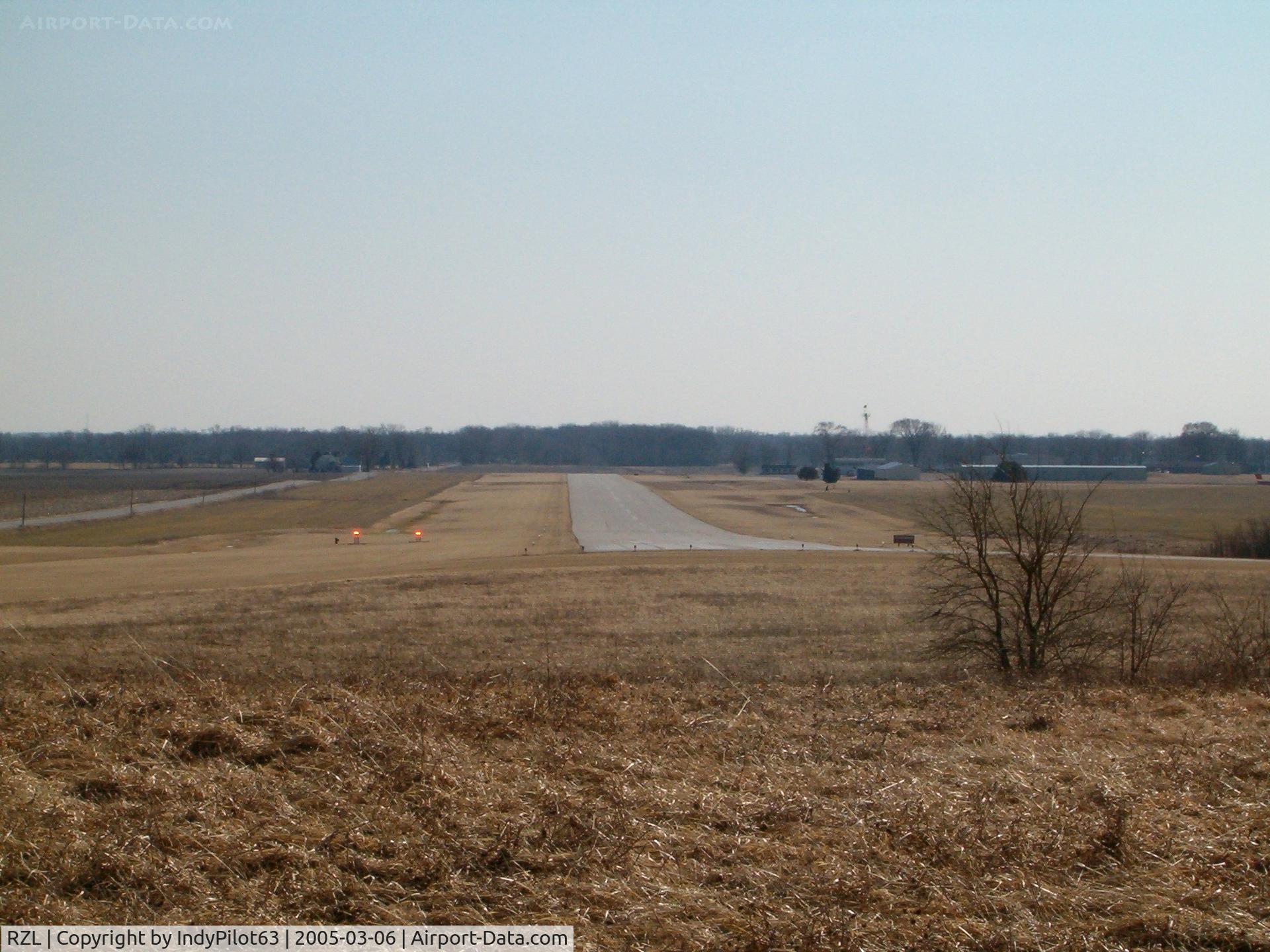 Jasper County Airport (RZL) - runway, as seen from the road.