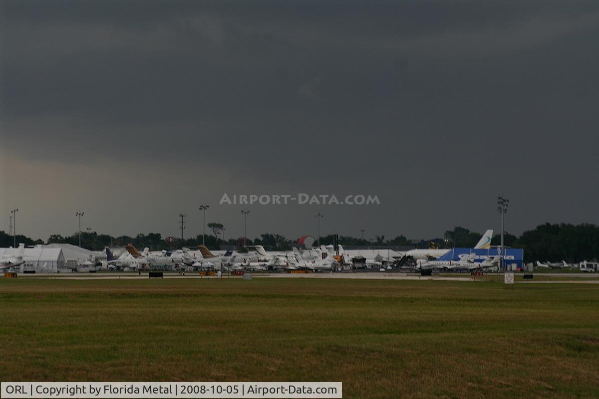 Executive Airport (ORL) - Storm clouds gather over NBAA Orlando