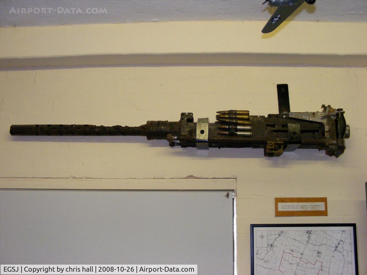 Seething Airfield Airport, Norwich, England United Kingdom (EGSJ) - 50 Cal. machine gun in the Seething airfield Control Tower Museum