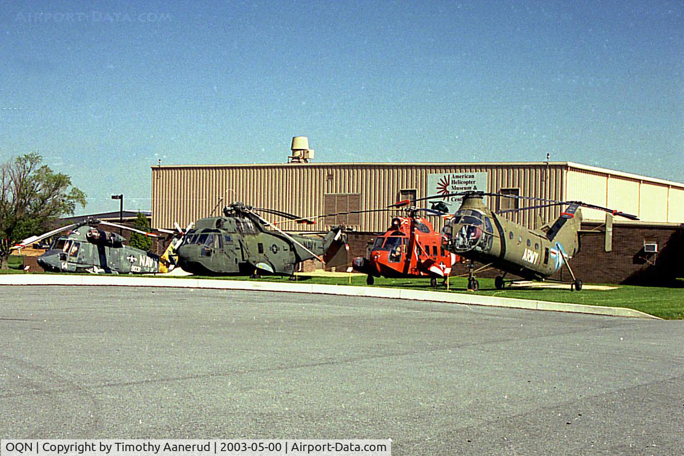 Brandywine Airport (OQN) - American Helicopter Museum, left-right, Kaman HH-2D, Sikorsky HH-3, Sikorsky HH-52, Piasecki CH-21B.  The musuem was closed the day I was here.  A Bell V-22 is also on display outside.