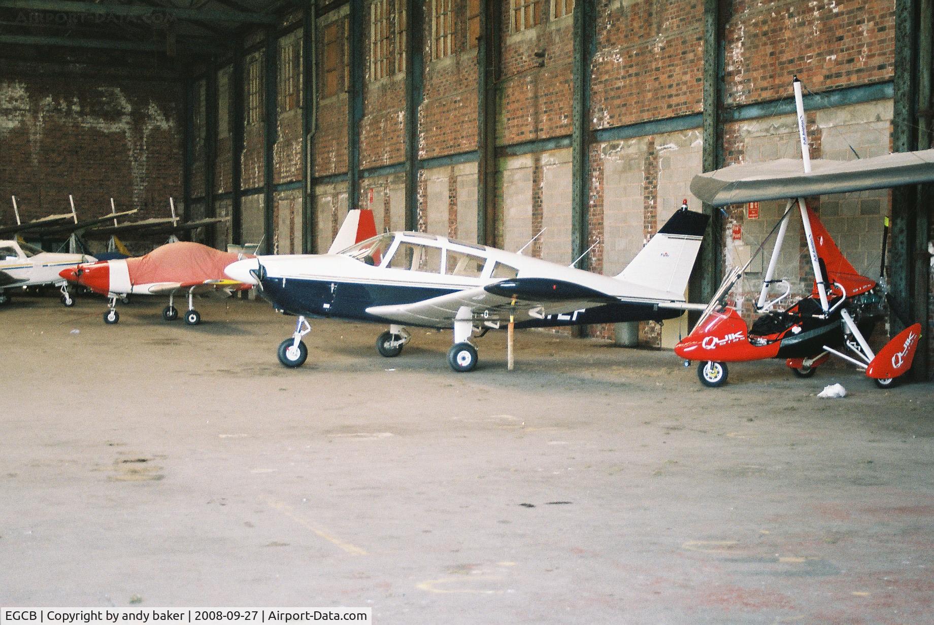 City Airport Manchester, Manchester, England United Kingdom (EGCB) - just one of the aircraft inside the hanger at barton-uk