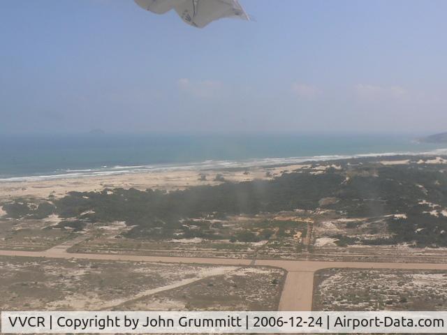 Cam Ranh Airport, Nha Trang Viet Nam (VVCR) - Aerial view of runway after takeoff.
