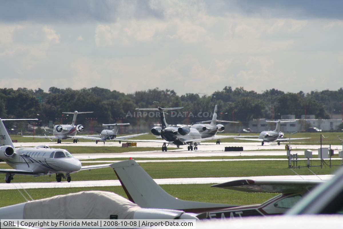 Executive Airport (ORL) - Line up of departing aircraft on NBAA last day