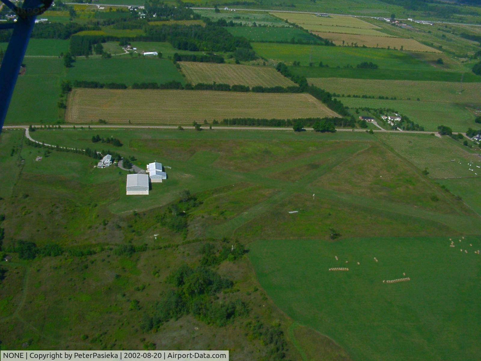NONE Airport - Private airfield in Southern Ontario, Canada. The only airport that I know of that has four runways in different directions.