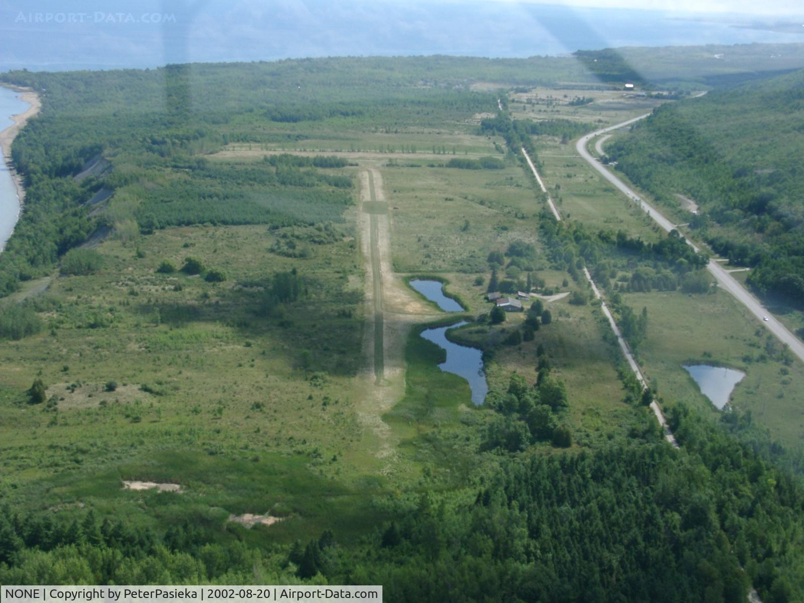 NONE Airport - This used to be a glider port. Today the runway has been obstructed by communication towers.