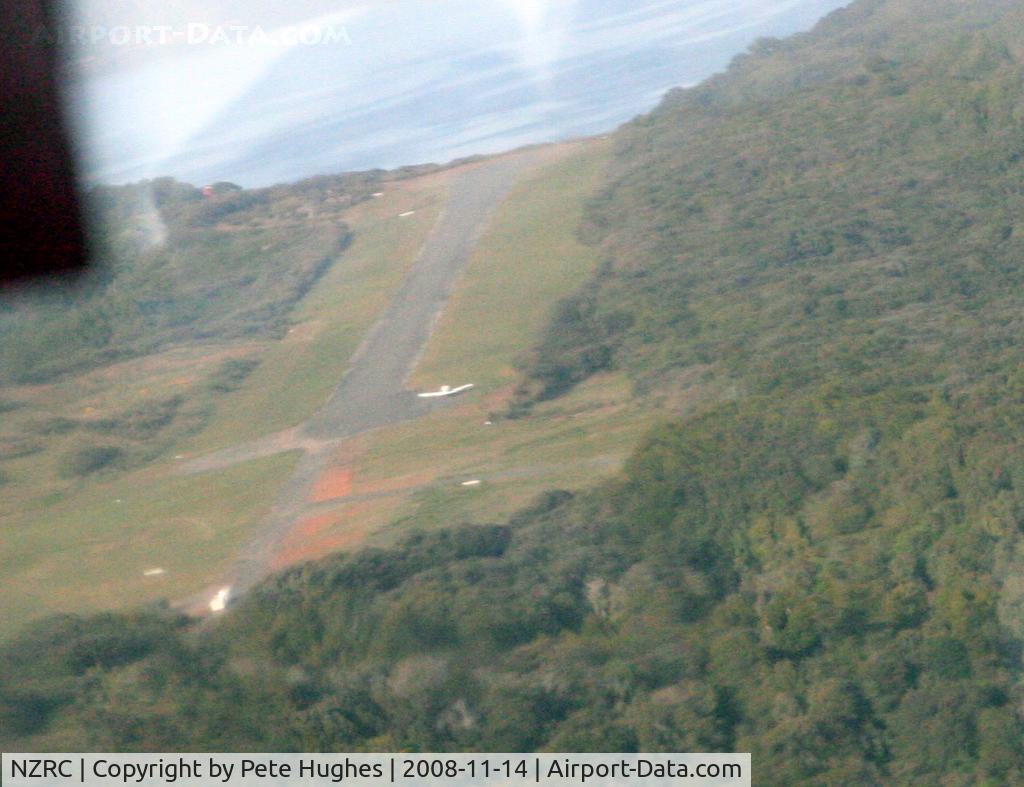 Ryans Creek Aerodrome Airport, Half Moon Bay, Stewart Island New Zealand (NZRC) - Stewart Island NZ, arriving in Islander ZK-FWZ - note parked Pa32 by threshold