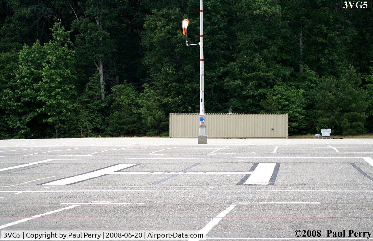 Thomas Nelson Community College Heliport (3VG5) - The parking-lot helipad and windsock.
