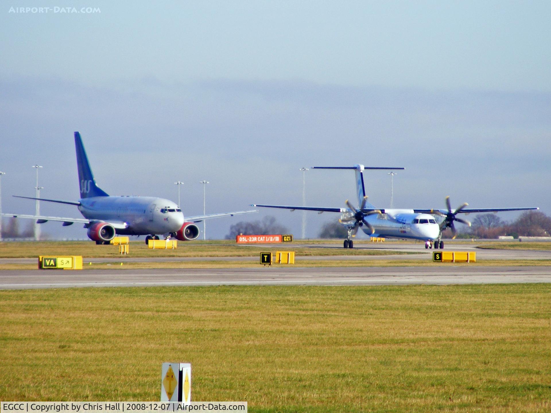 Manchester Airport, Manchester, England United Kingdom (EGCC) - LN-RCW and G-ECOI