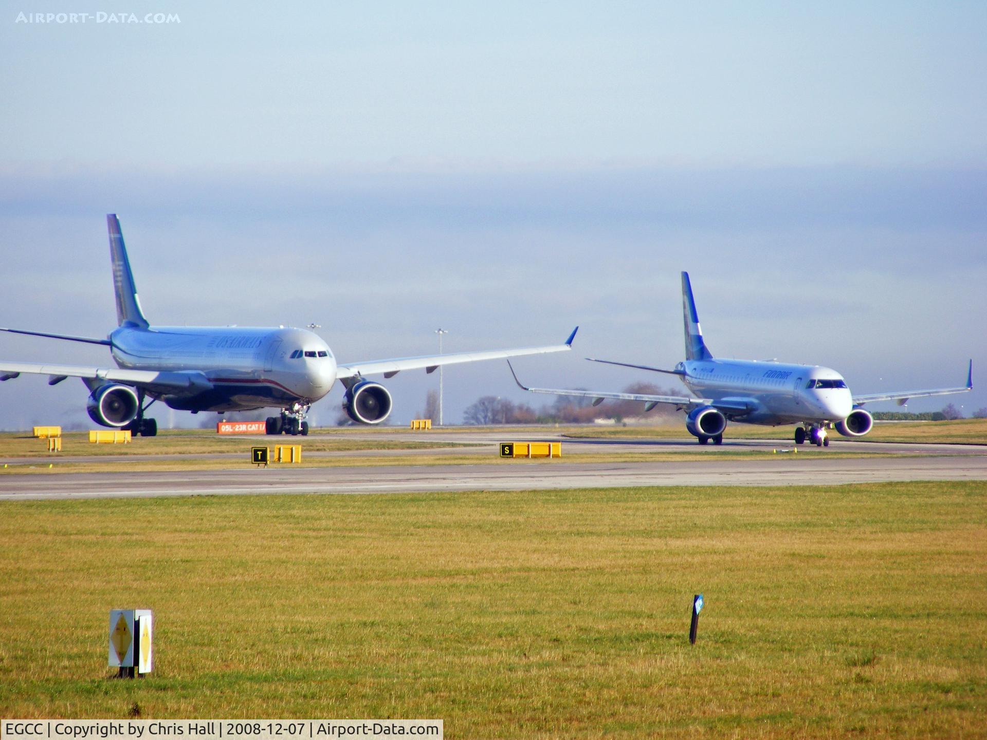 Manchester Airport, Manchester, England United Kingdom (EGCC) - N271AY and OH-OKG