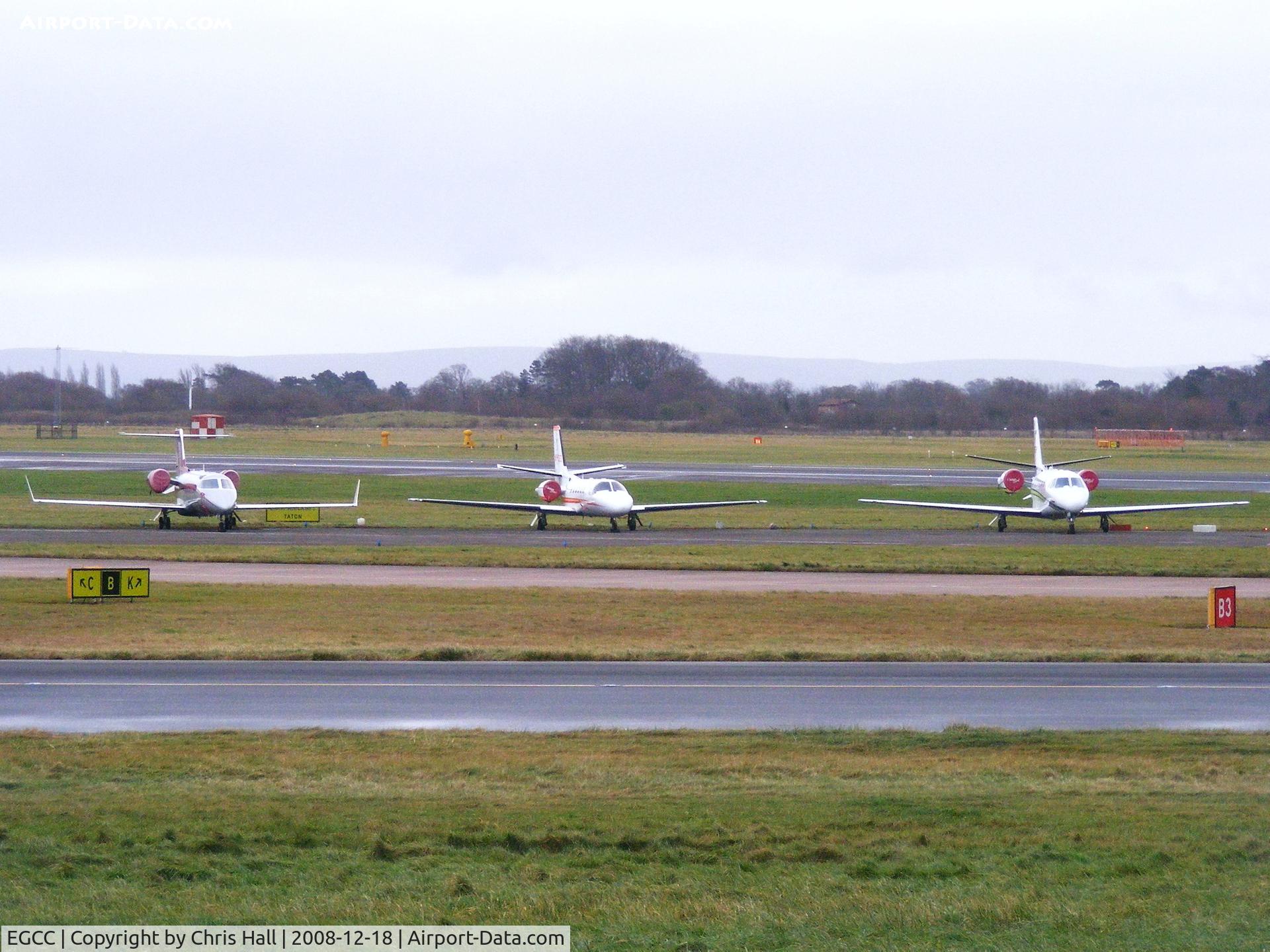 Manchester Airport, Manchester, England United Kingdom (EGCC) - from left to right G-RWGW; VP-CED; N560TH