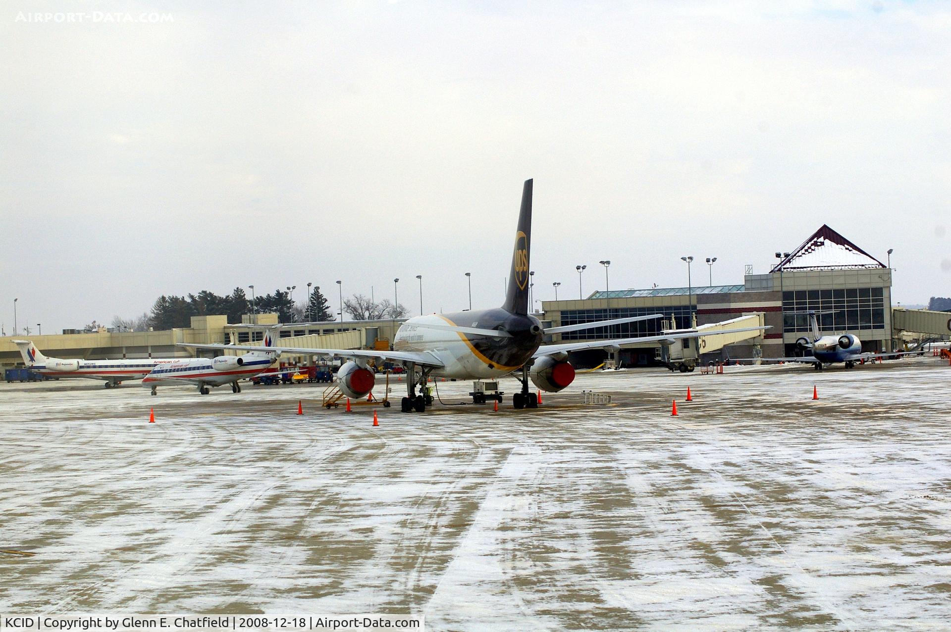 The Eastern Iowa Airport (CID) - Looking at the terminal from the tower's 2nd floor window.  UPS is parked while two Eagle Flights are parking