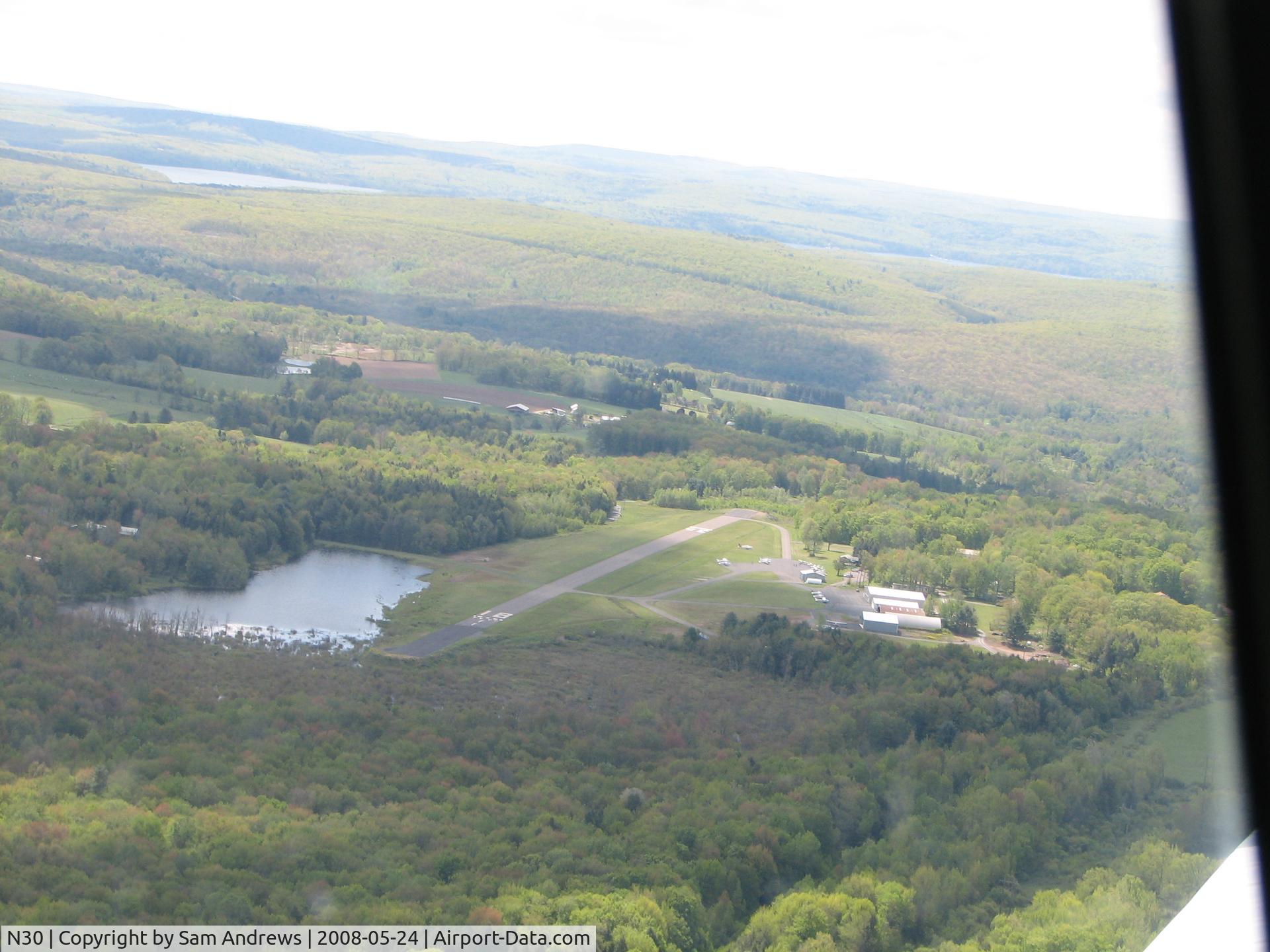 Cherry Ridge Airport (N30) - Coming from the west, we were on downwind before we saw the airport.  Had to make a pretty quick turn to get on the downwind leg.  We did it though.