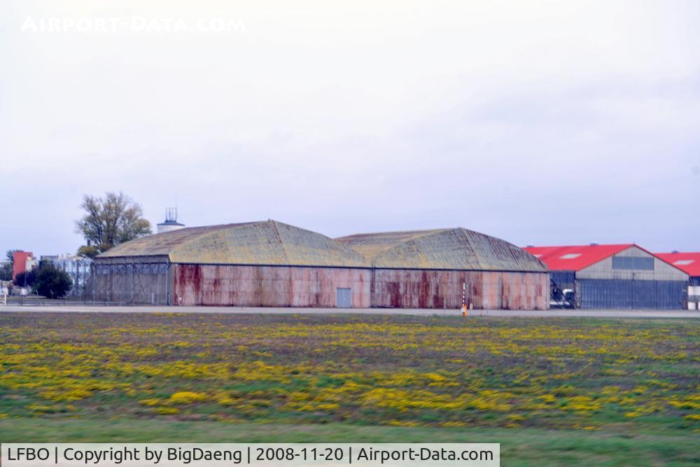 Toulouse Airport, Blagnac Airport France (LFBO) - Old hangar building, seen from taxiing aircraft window.