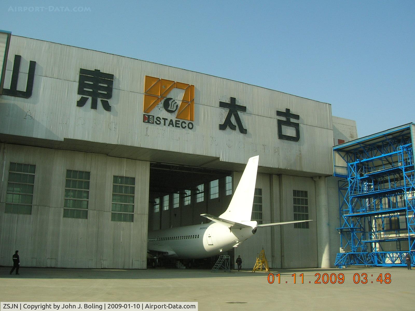 Jinan Yaoqiang Airport, Jinan, Shandong China (ZSJN) - N494AC in STAECO Hangar at end of 'C' Check