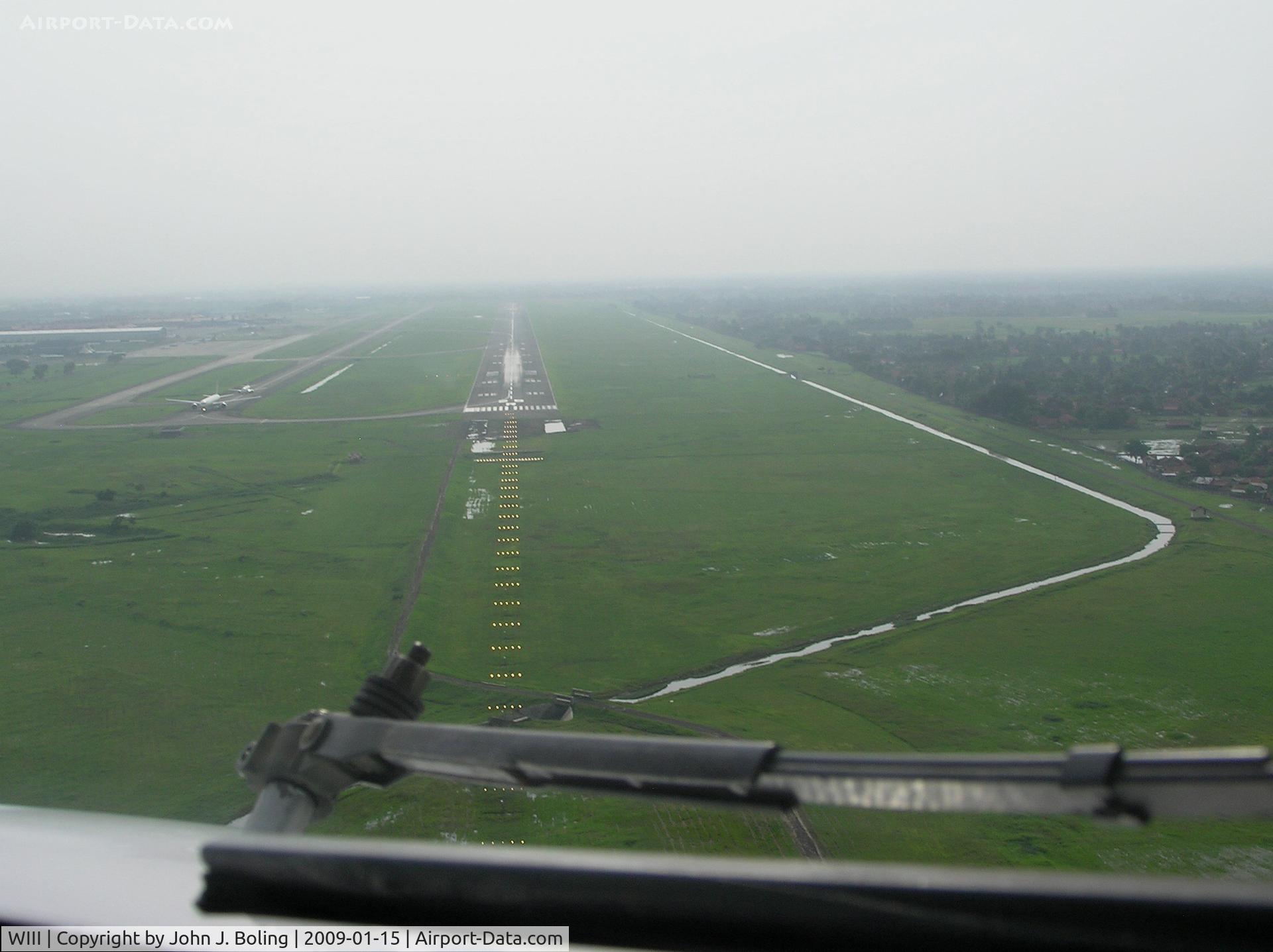 Soekarno-Hatta International Airport, Cengkareng, Banten (near Jakarta) Indonesia (WIII) - Runway 25R at Jakarta international Airport