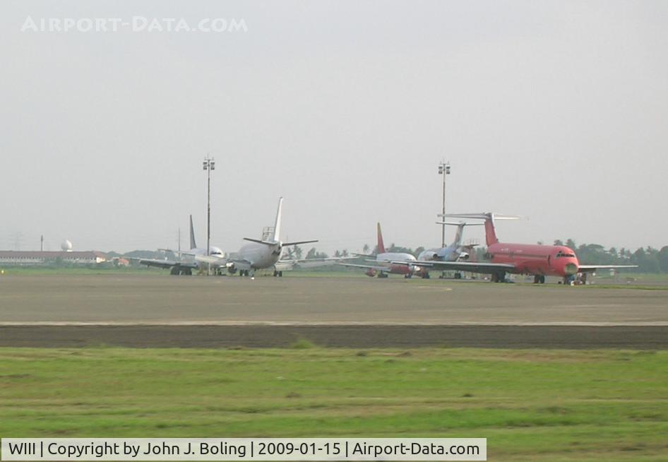 Soekarno-Hatta International Airport, Cengkareng, Banten (near Jakarta) Indonesia (WIII) - Many aircraft in need of repair at Jakarta