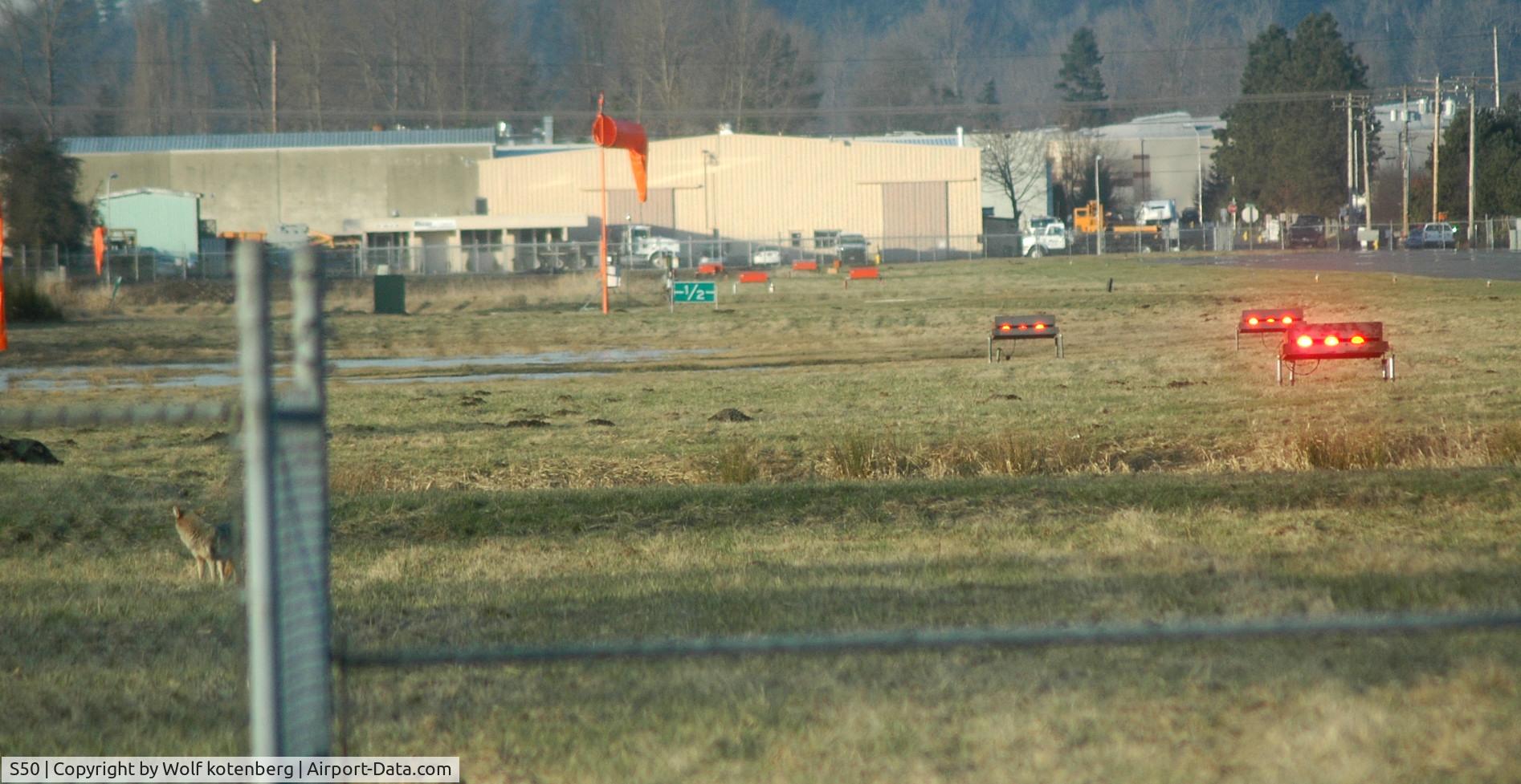 Auburn Municipal Airport (S50) - radio chatter indicated a coyote near the S end of 34