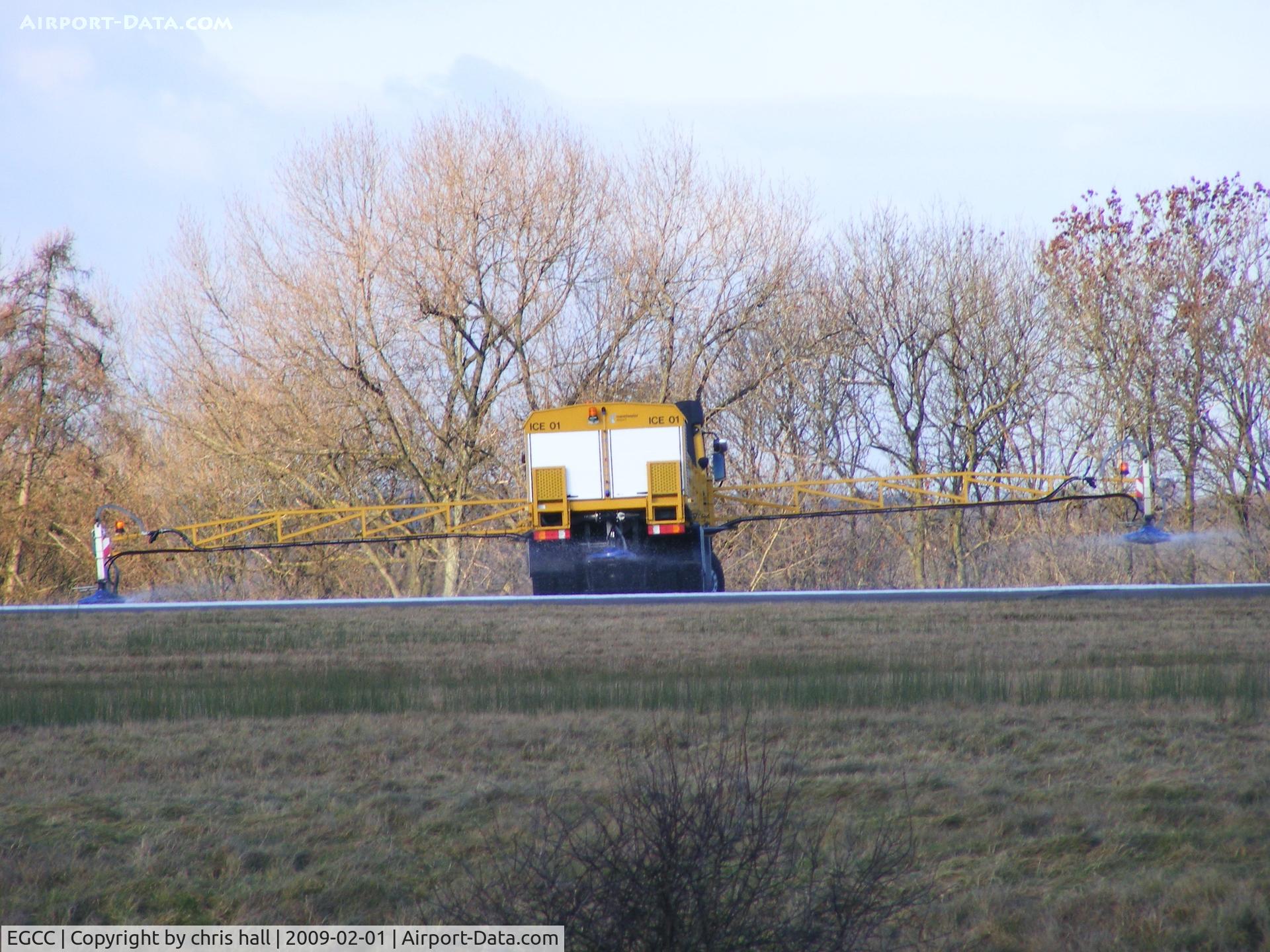 Manchester Airport, Manchester, England United Kingdom (EGCC) - Spraying deicer on the runway 