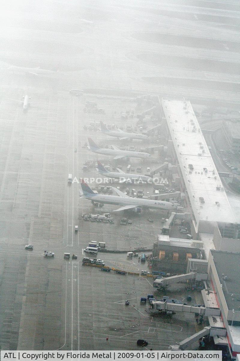 Hartsfield - Jackson Atlanta International Airport (ATL) - Concouse T in ATL and we are in the clouds