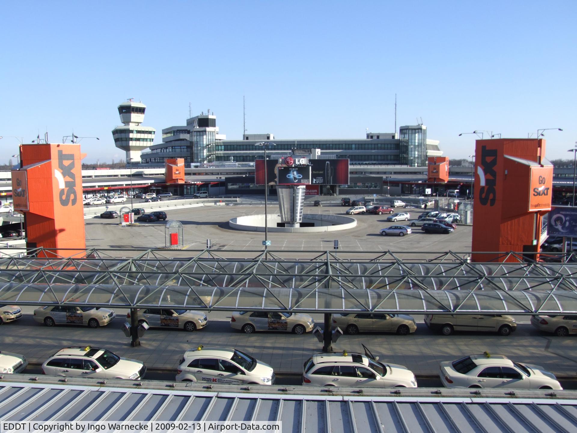 Tegel International Airport (closing in 2011), Berlin Germany (EDDT) - Berlin Tegel, looking across the hexagonal terminal at the main terminal building and tower