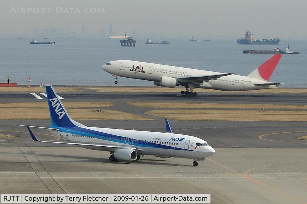 Tokyo International Airport (Haneda), Ota, Tokyo Japan (RJTT) - At Tokyo Haneda the Runway backs right onto the waterfront