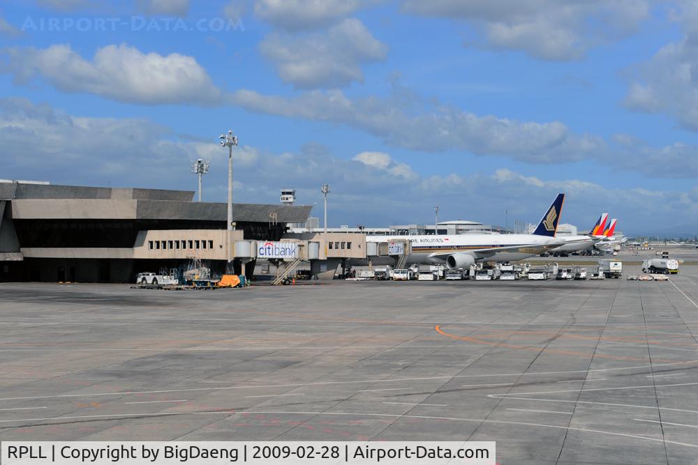 Ninoy Aquino International Airport, Manila Philippines (RPLL) - Flight line from passenger cabin of THAI TG621.