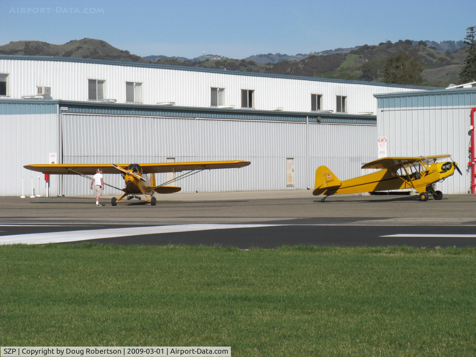 Santa Paula Airport (SZP) - A pair of Piper J3C CUBS-N1592N & N98425 