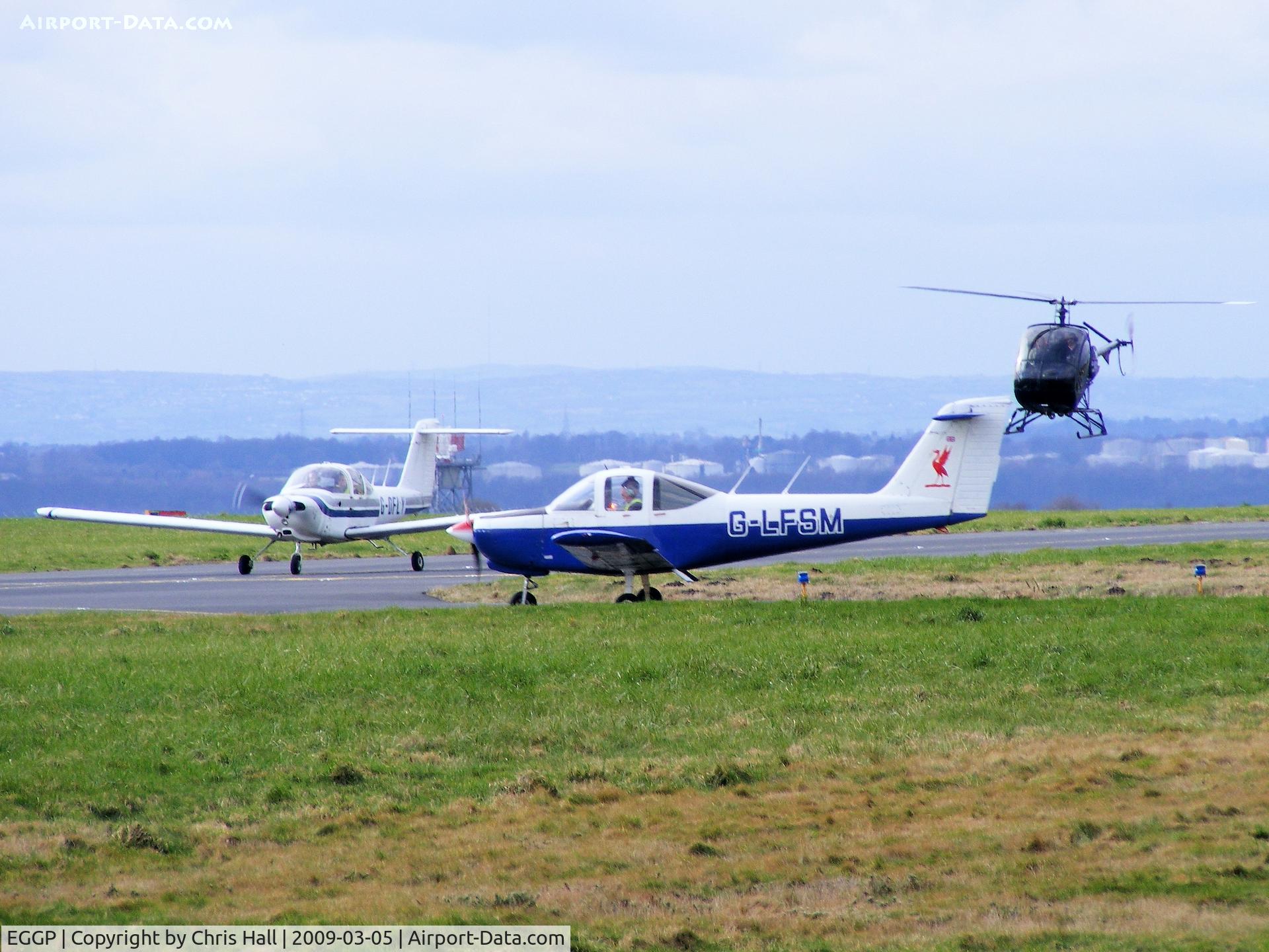 Liverpool John Lennon Airport, Liverpool, England United Kingdom (EGGP) - busy day for GA at Liverpool Airport