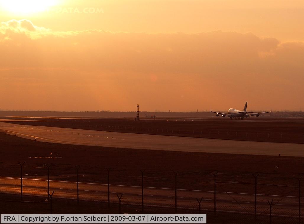 Frankfurt International Airport, Frankfurt am Main Germany (FRA) - Cathay Pacific after touch down in the sunset