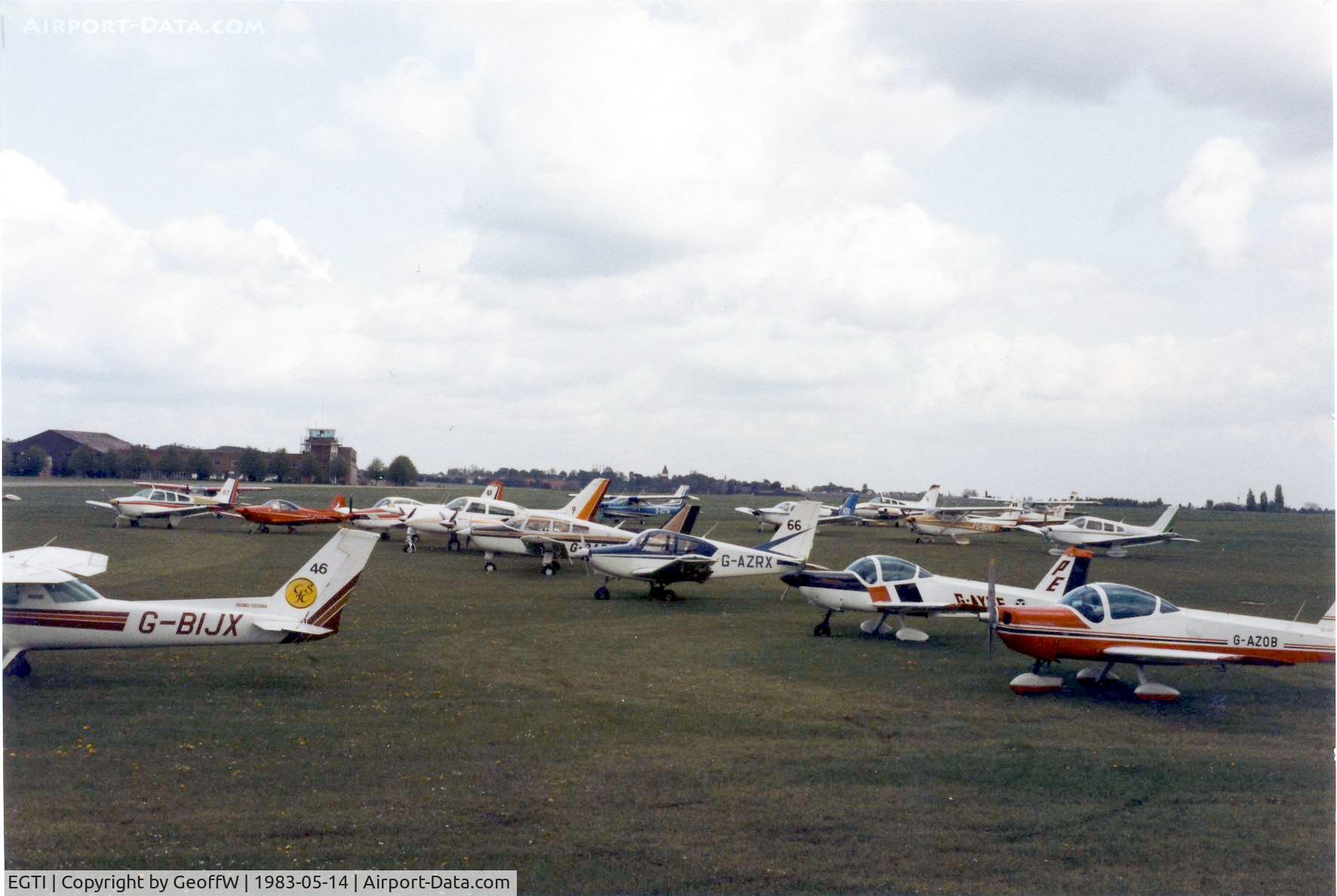 EGTI Airport - A view across Leavesden airfield with the competitors gathered for the start of the London to Londonderry Air Race of 1983