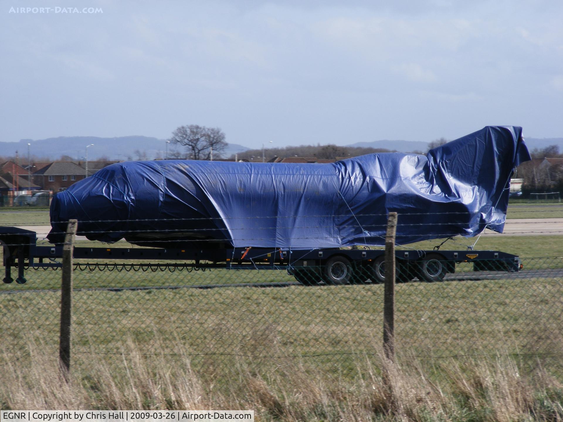 Hawarden Airport, Chester, England United Kingdom (EGNR) - a new Hawker bizjet being transported across the airfield