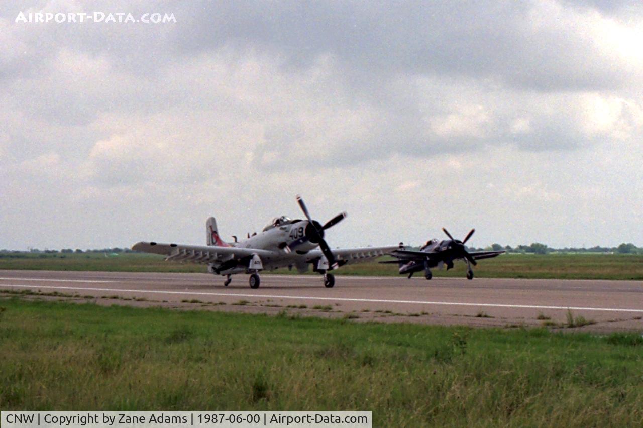 Tstc Waco Airport (CNW) - Skyraider and Bearcat taxi on the runway at the 1987 Waco Airshow