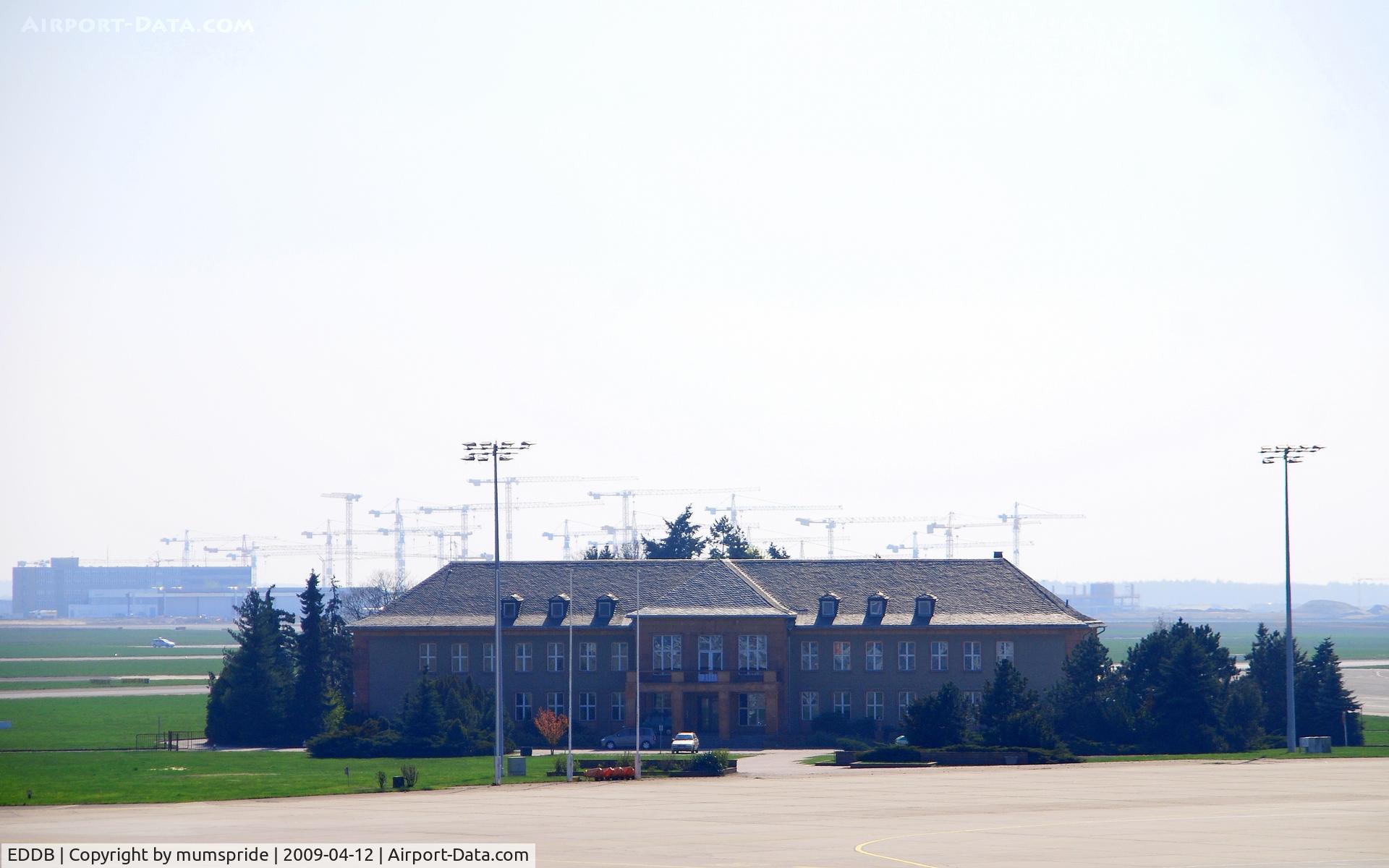 Berlin Brandenburg International Airport, Berlin Germany (EDDB) - Building where former GDR-Leaders welcomes foreign guests and themselves, too. In the background grows new Berlin Airport BBI