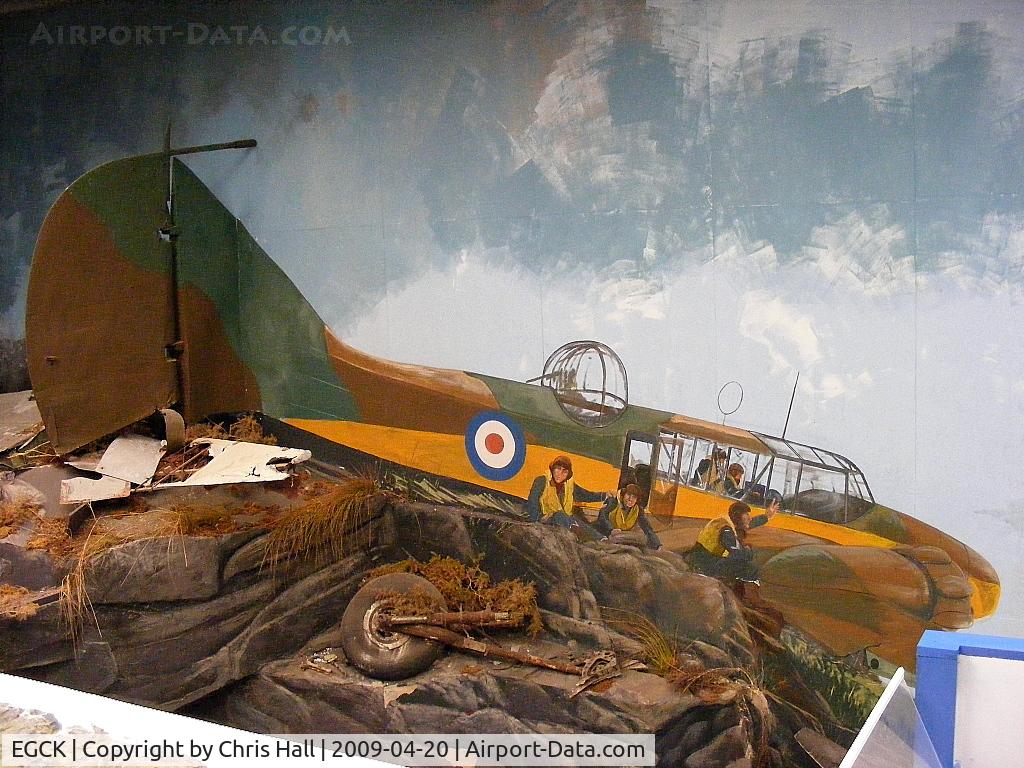 Caernarfon Airport, Caernarfon, Wales United Kingdom (EGCK) - painting depicting a plane crash in North Wales. The tail and undercarrage were recovered from the crash site
