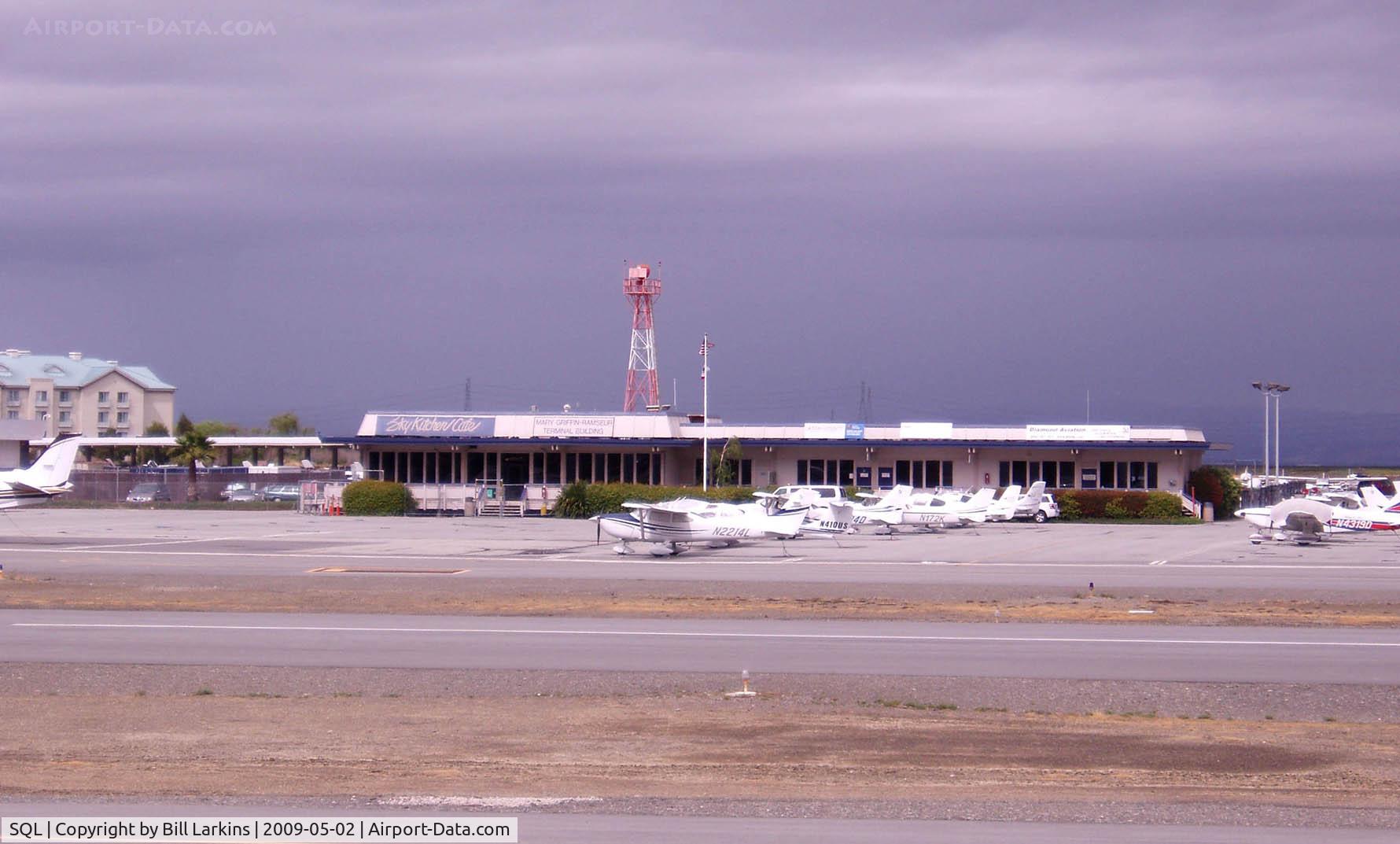 San Carlos Airport (SQL) - Panorama 1 of 4. SkyKitchenCafe on left of ad bldg.