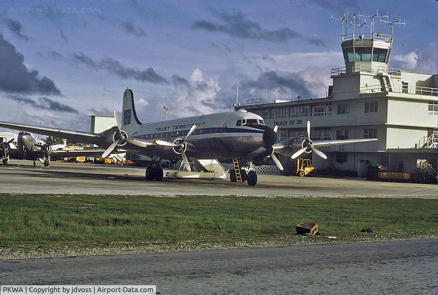 Kwajalein Airport, Kwajalein Marshall Islands (PKWA) - Trust Territory (Dept of the Interior) DC-4 prepares to depart for 5 hour flight to Truk.