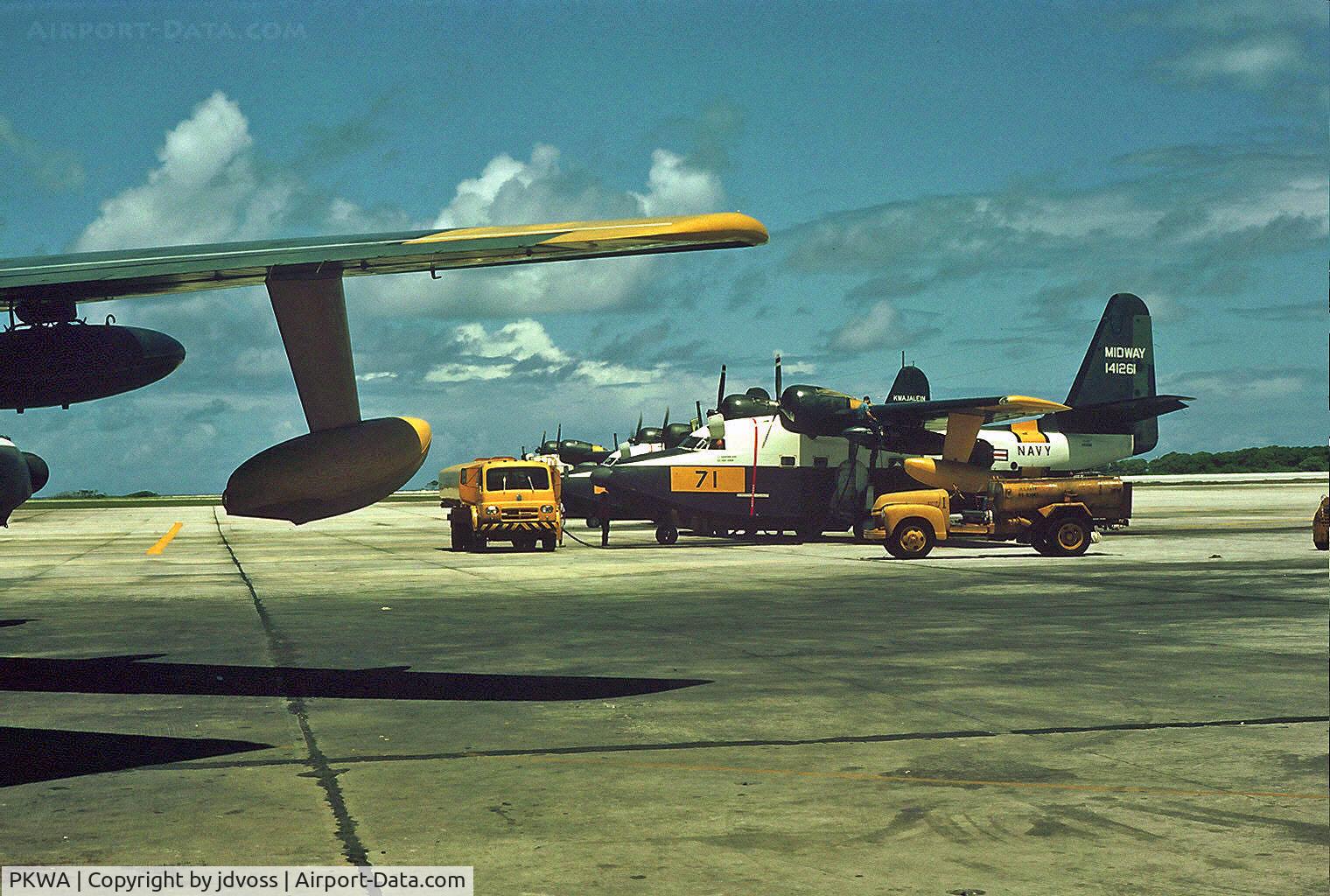 Kwajalein Airport, Kwajalein Marshall Islands (PKWA) - HU-16 visiting from NAS Midway is re-fueled