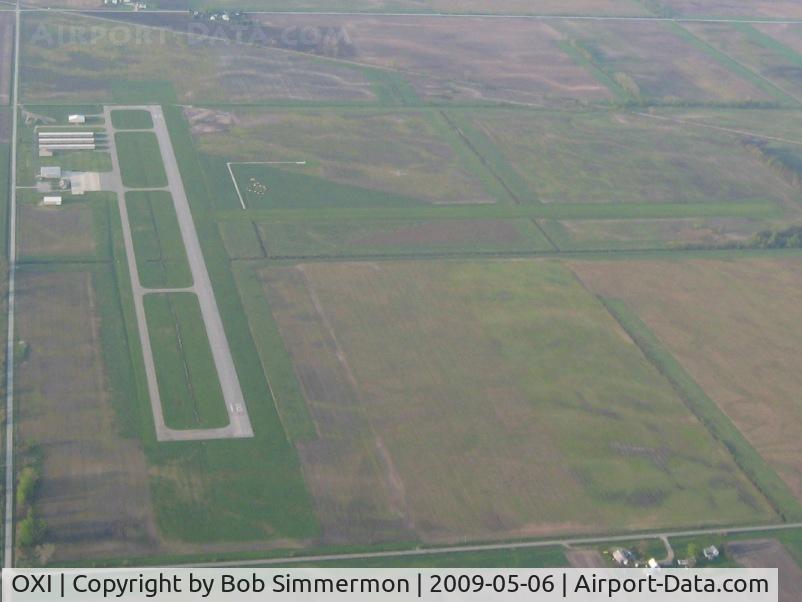 Starke County Airport (OXI) - Looking south from 3000'. The E-W grass runway can be seen.